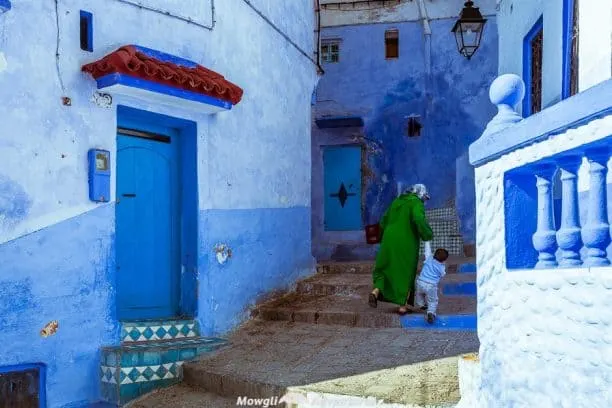 Exploring the magic of Chefchaouen, Morocco's blue city. The residents of Chefchaouen have painted everything blue and white. The buildings, the pavements, the steps and the doors are all painted in a multitude of shades of blue. #Travel #Morocco #Chefchaouen #TravelGuide Click this link for the full article //mowgli-adventures.com/chefchaouen-morocco-blue-city/