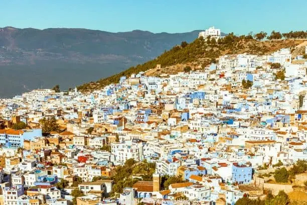 Exploring the magic of Chefchaouen, Morocco's blue city. The residents of Chefchaouen have painted everything blue and white. The buildings, the pavements, the steps and the doors are all painted in a multitude of shades of blue. #Travel #Morocco #Chefchaouen #TravelGuide Click this link for the full article //mowgli-adventures.com/chefchaouen-morocco-blue-city/
