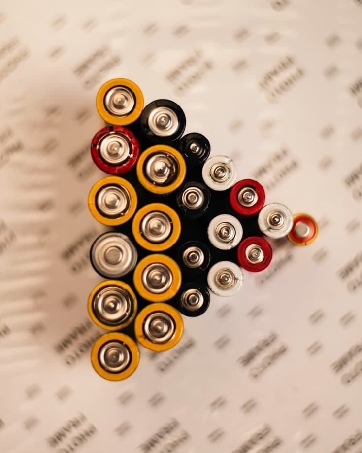 Batteries laid out in a triangle formation seen from above