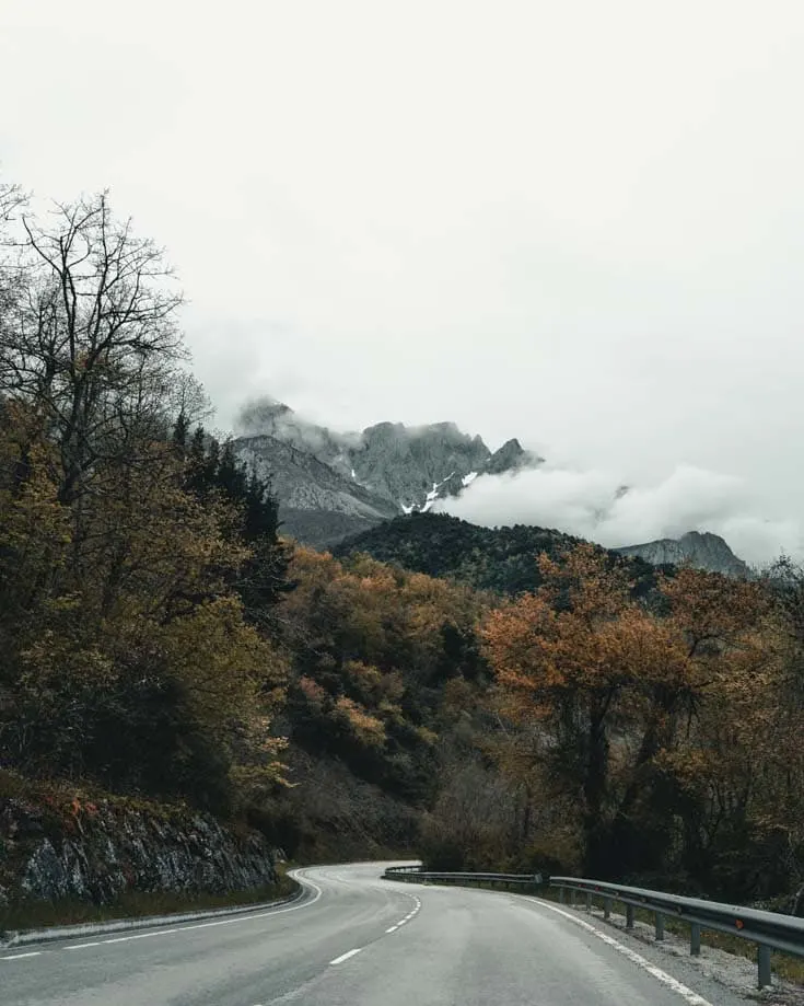 A road winding through the mountains of Picos de Europa