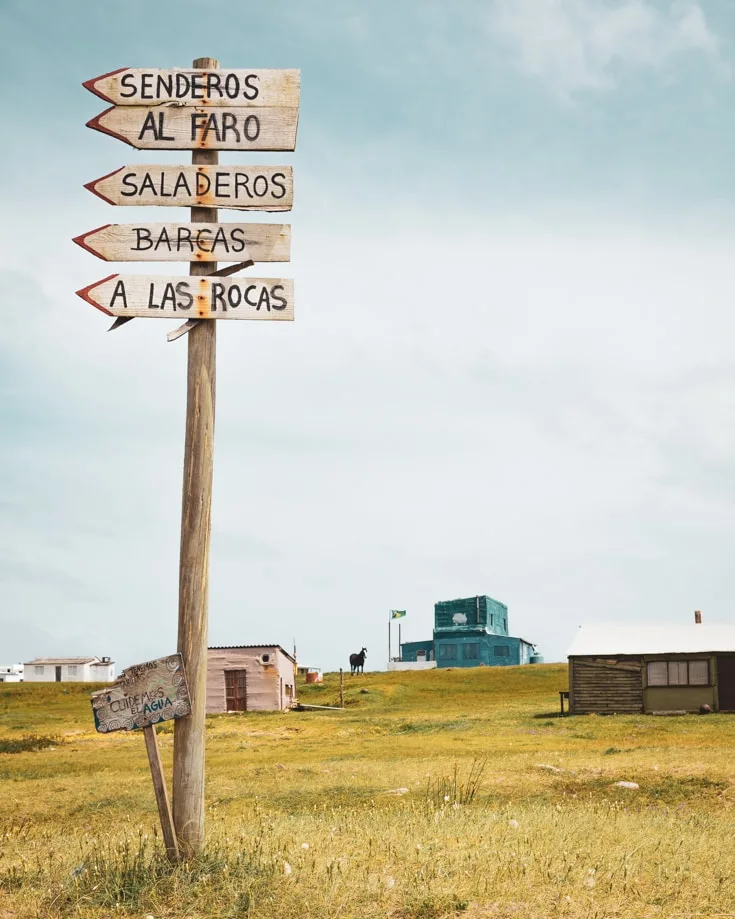 A wooden street sign in Cabo Polonio