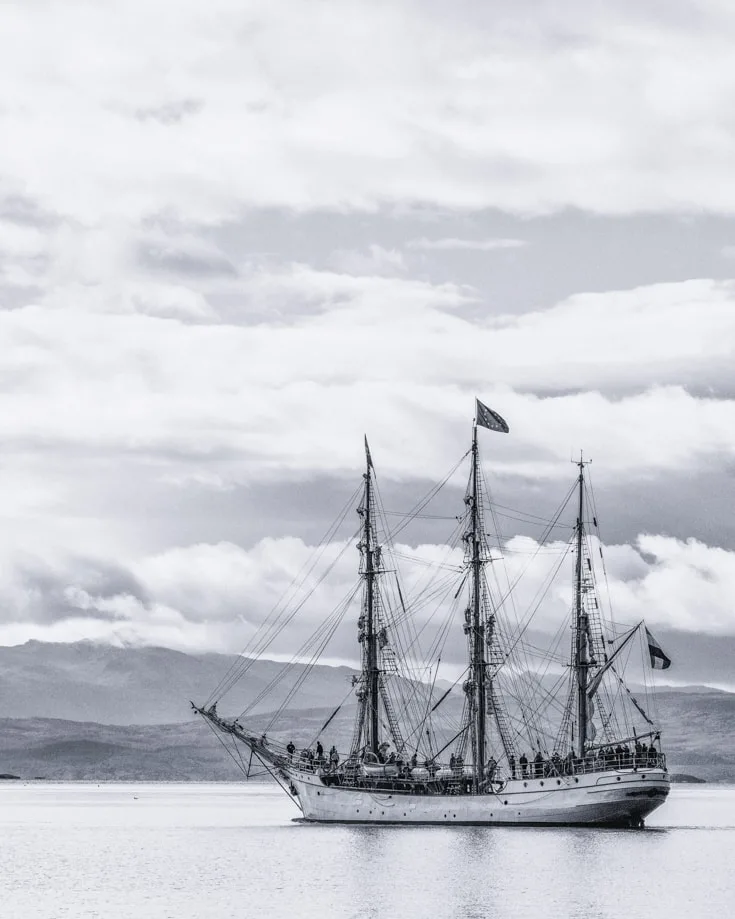 clipper ship setting sail down the Beagle channel in Patagonia