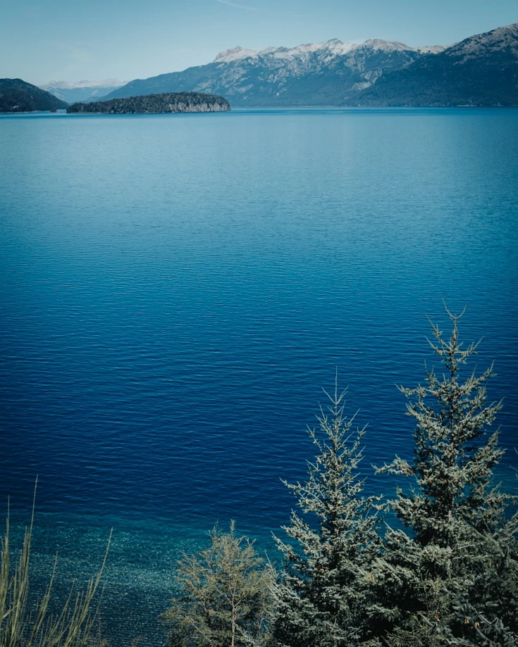 Mountains on the shore of a blue lake on Ruta de los Siete Lagos Argentina