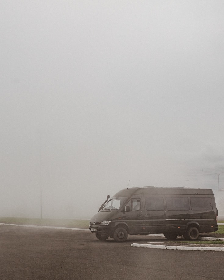 Camper van living in foggy bad weather