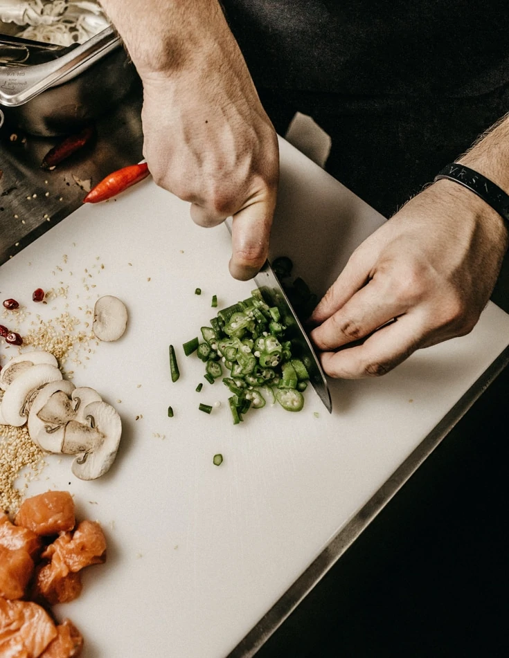 Preparing vegetables on a chopping board