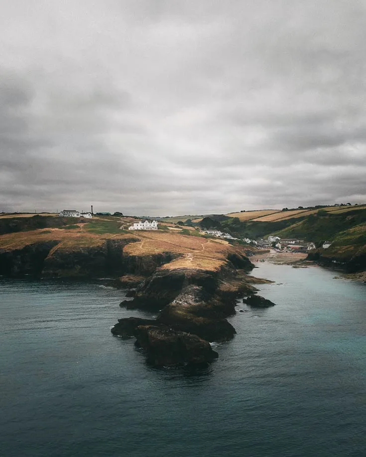 An aerieal view lookin into Port Isaac Cornwall from teh ocean