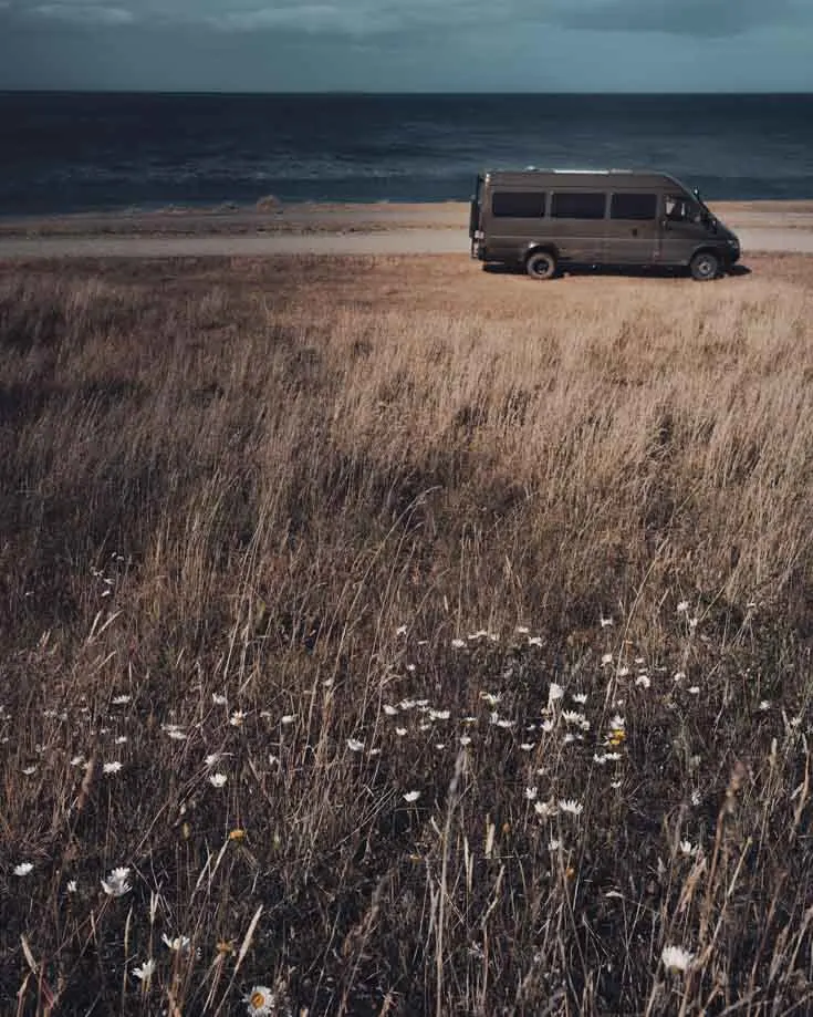 campervan parked by the ocean off grid living at its finest