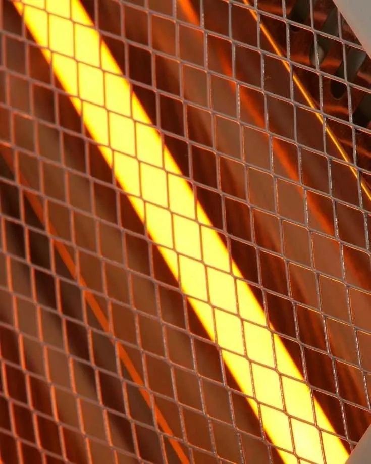 Electric heater bar glowing orange