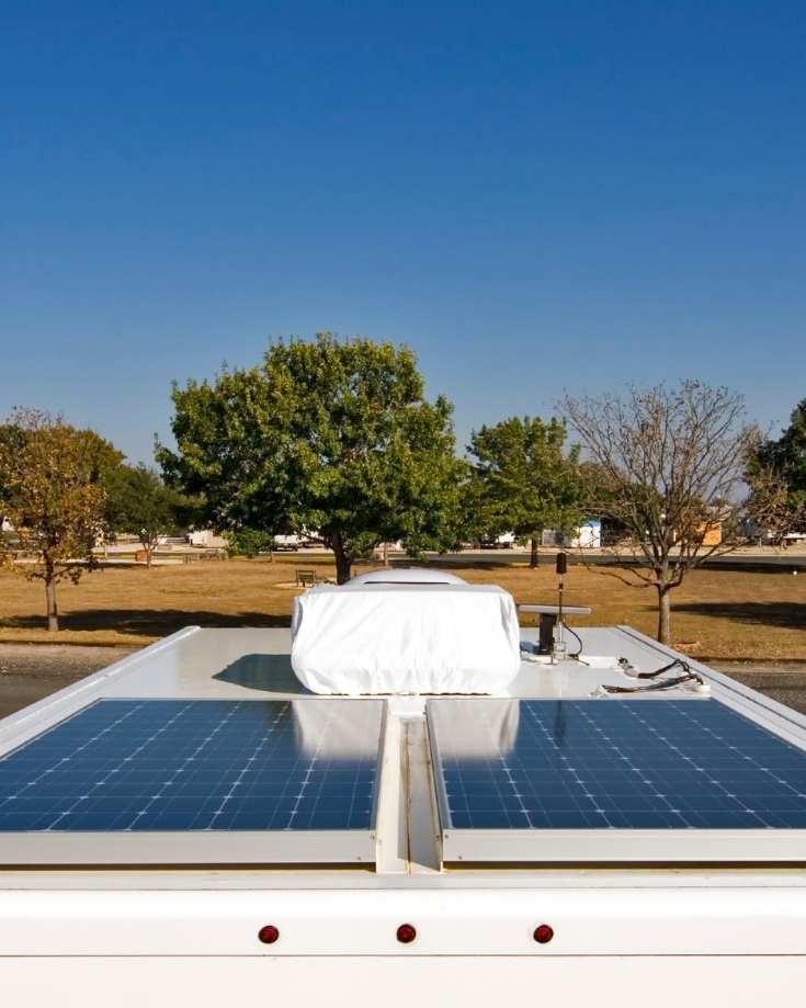 Solar panels on an RV roof with space for more