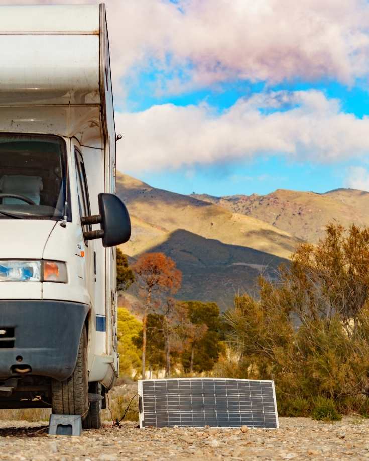 Solar panels beside an RV