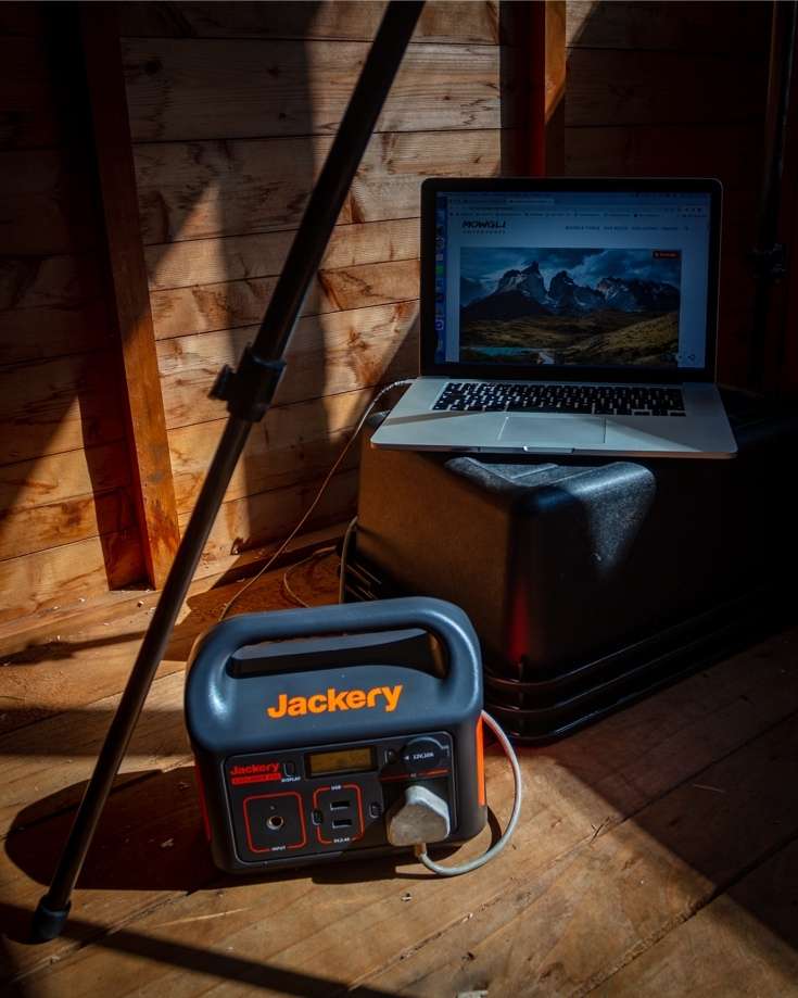Jackery 240 power station charging a laptop