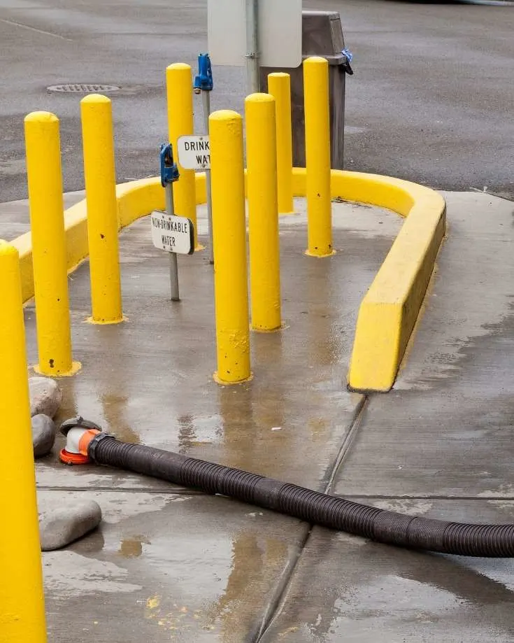 A dump station without RV Sewer Hose Support