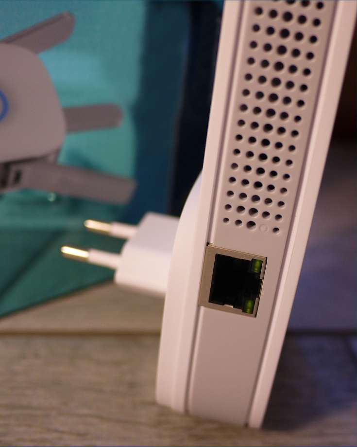Close-up of an RV WiFi booster with ethernet port