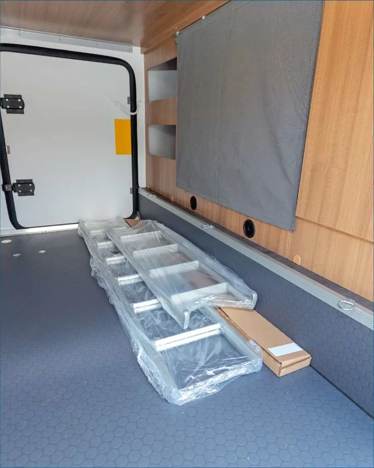 Hidden storage compartments making van life more organized.
