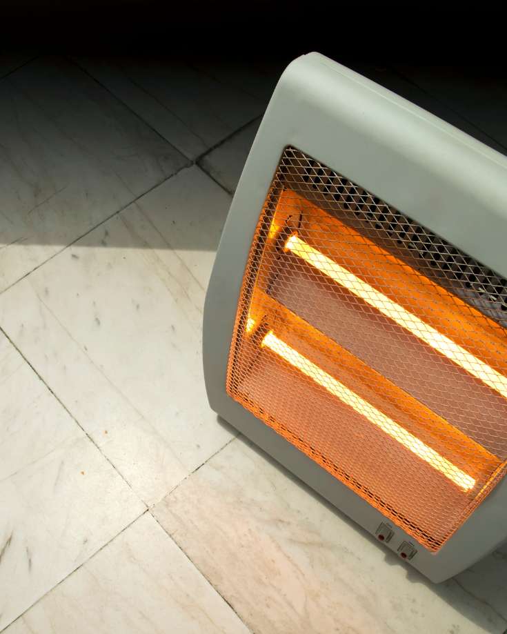 Portable infrared electric heater in RV interior
