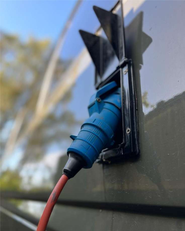 An RV converter is designed to charger a battery when hooked up to shore power