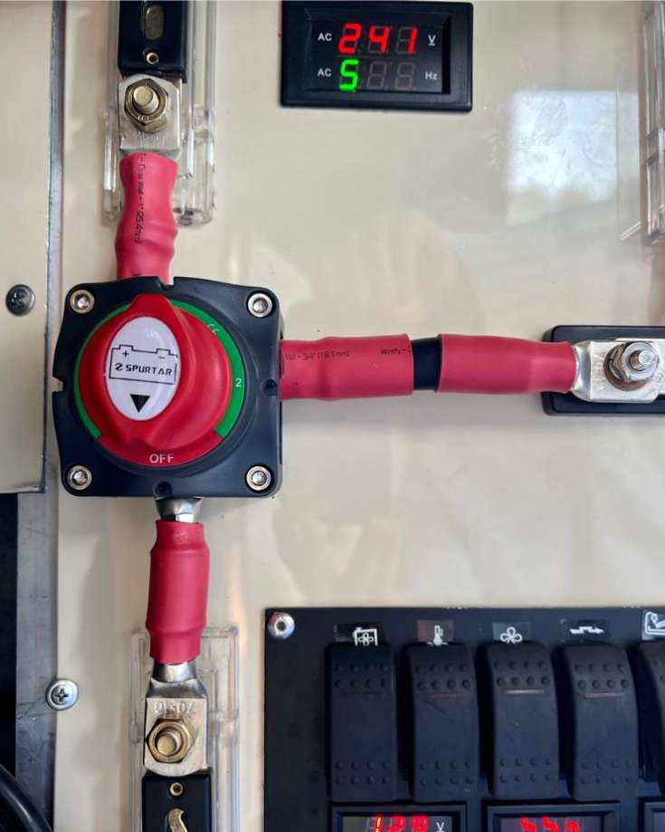 The supply cables for an RV converter charging a battery